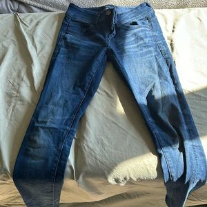 Almost new, dark blue skinny jeans.  Tall in length.